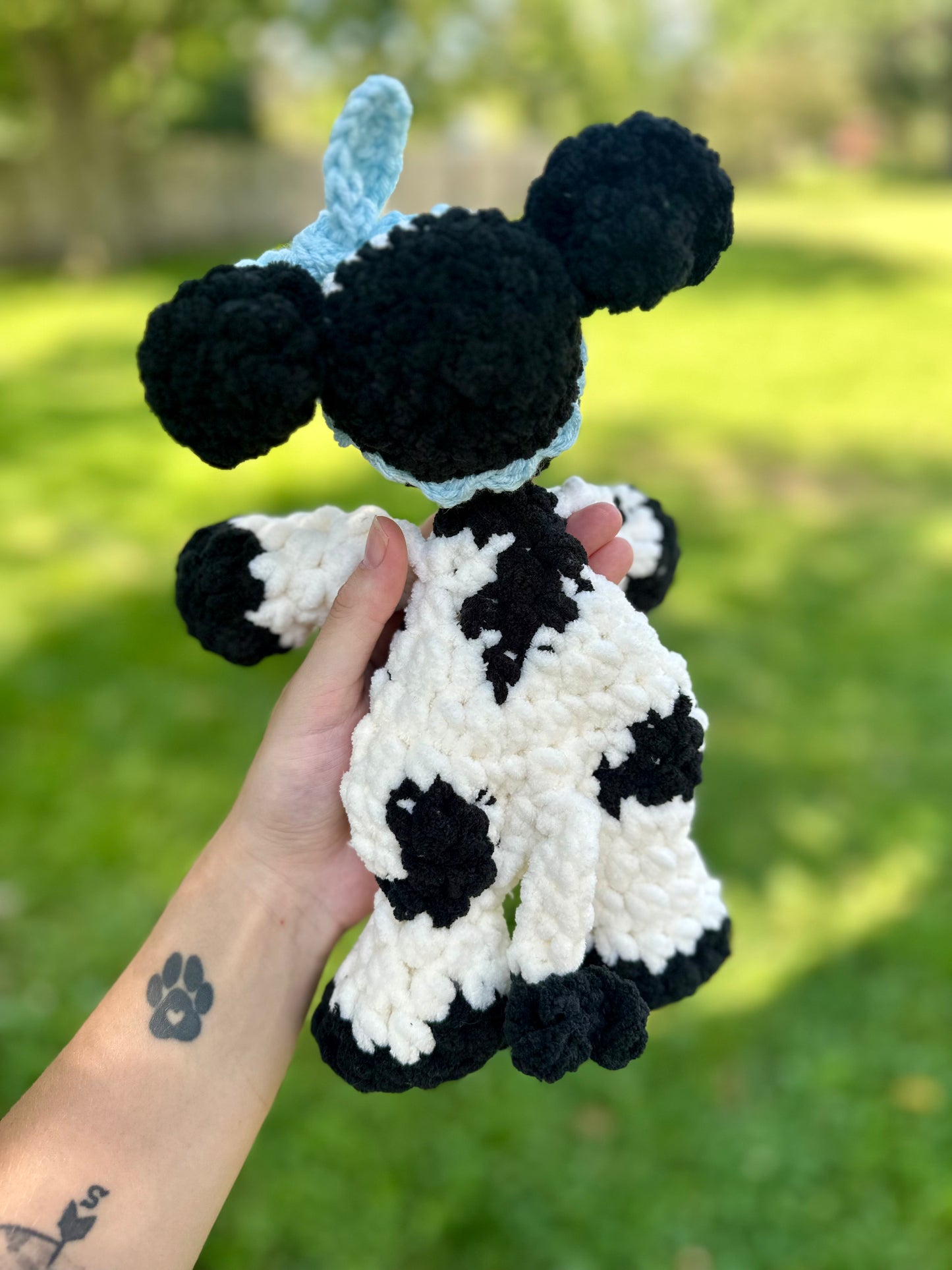 Black and White Cow Snuggler
